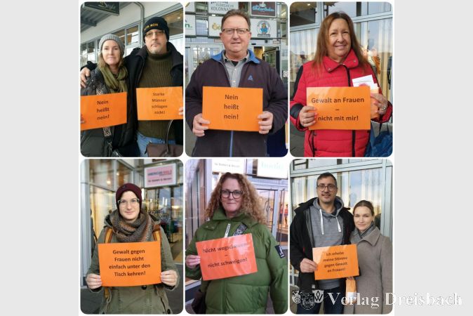 Einige Passanten ließen sich mit Aussagen gegen Gewalt fotografieren.