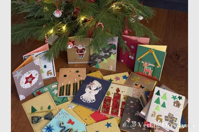 Die selbst gebastelten Weihnachtskarten des VdK werden am 9. Dezember an EVIM übergeben.